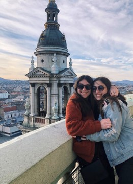 Hackman and friend in front of Budapest skyline.